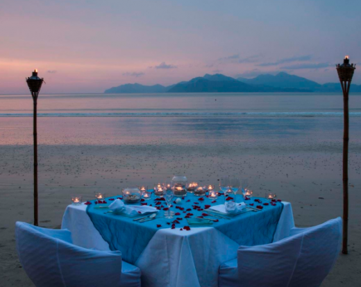 Private dining on Top 10 beach in the world with jungle backdrop